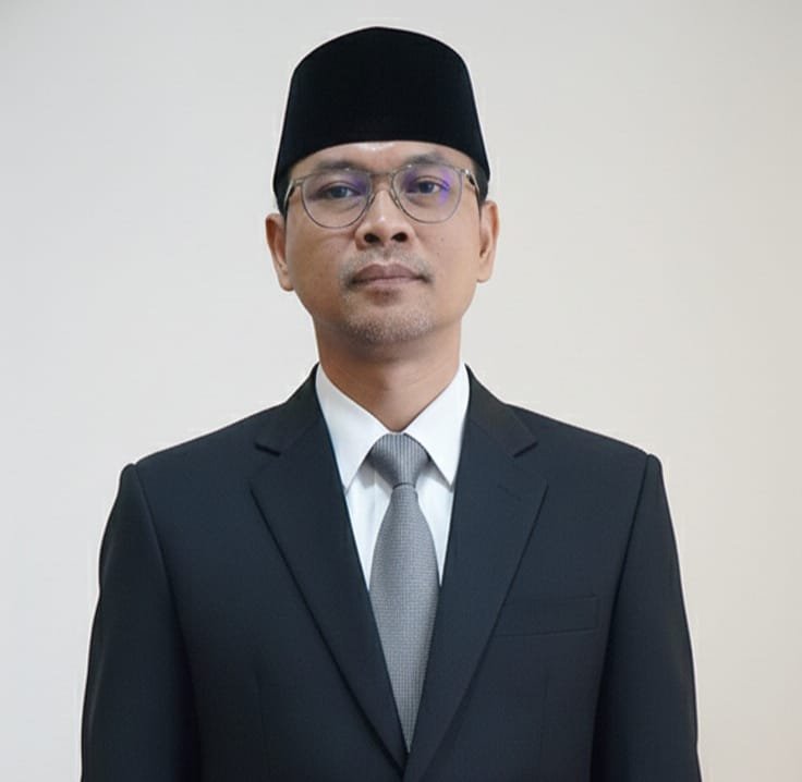 Caption: Plt Kepala Bapenda Lebak, Agung Budi Santoso