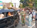 Caption : Koramil 0102 Cadasari bersama UPT Puskesmas Cigadung bagikan ribuan masker kepada pengendara Caption : Koramil 0102 Cadasari bersama UPT Puskesmas Cigadung bagikan ribuan masker kepada pengendara